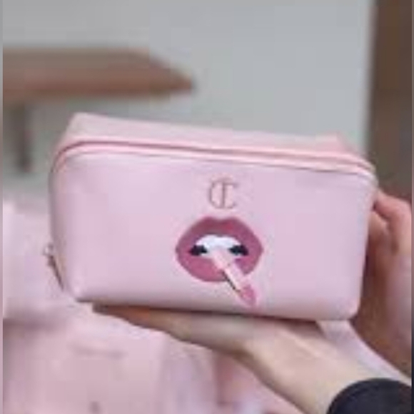 Charlotte Tirbury Handbags - Chic Pink Cosmetic Bag with Lip Design